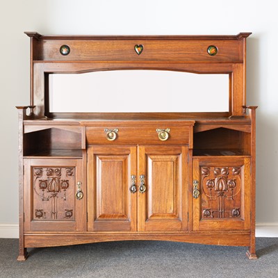 Lot 540 - An Arts and Crafts walnut sideboard, by Shapland & Petter of Barnstaple