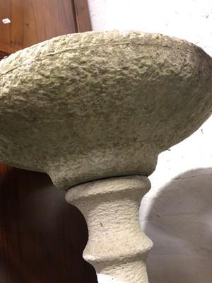 Lot 151 - A reconstituted stone garden seat, and a birdbath