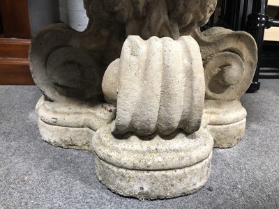 Lot 151 - A reconstituted stone garden seat, and a birdbath