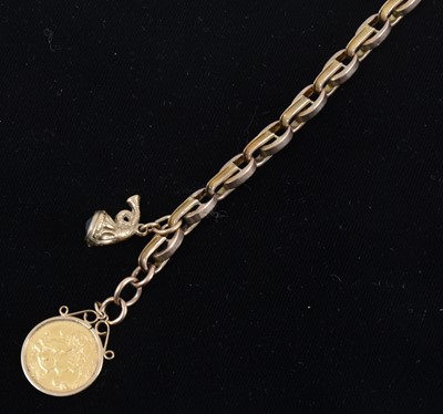 Lot 1304 - A rose metal bracelet with Half Sovereign 1913 and a small fob