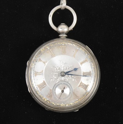 Lot 1370 - A silver open face pocket watch with double albert watch chain.