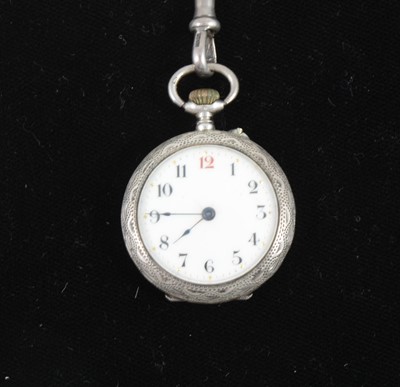 Lot 1372 - A lady's silver cased fob watch and chain.