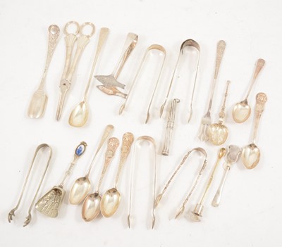 Lot 1218 - A collection of silver and plated decorative flatware, sugar tongs, grape scissors.