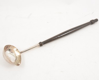 Lot 337 - A silver punch ladle with wooden handle.