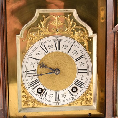 Lot 110 - A Walnut mantel clock, Lenzkirch movement striking on two gongs
