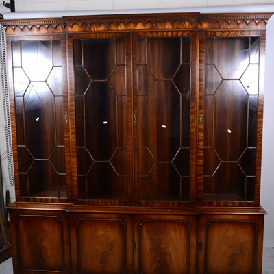 Lot 120 - A reproduction mahogany breakfront bookcase, George III style