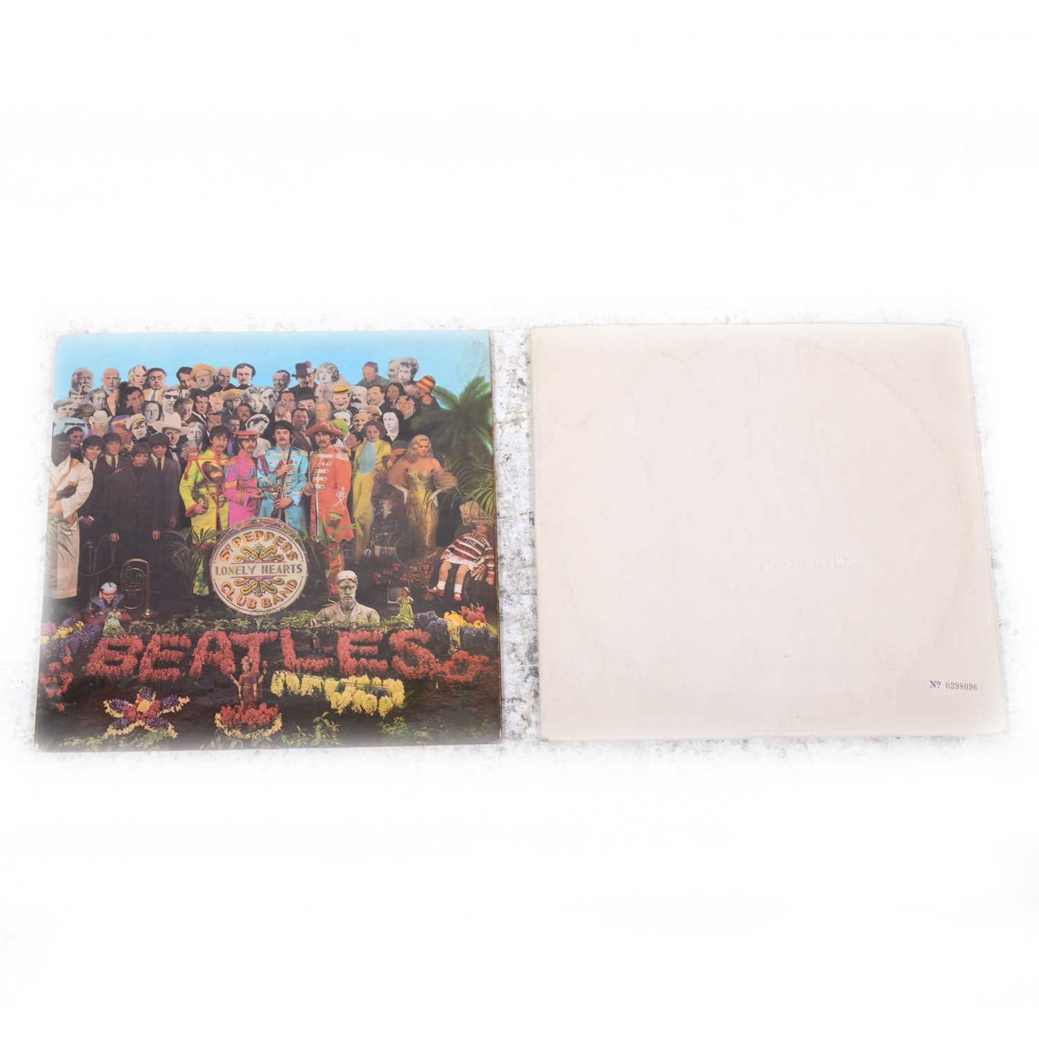 Lot 10 - The Beatles White Album and Sgt. Pepper's Loney Hearts Club Band vinyl LP records.