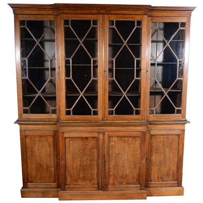 Lot 465 - Late Victorian oak breakfront bureau bookcase