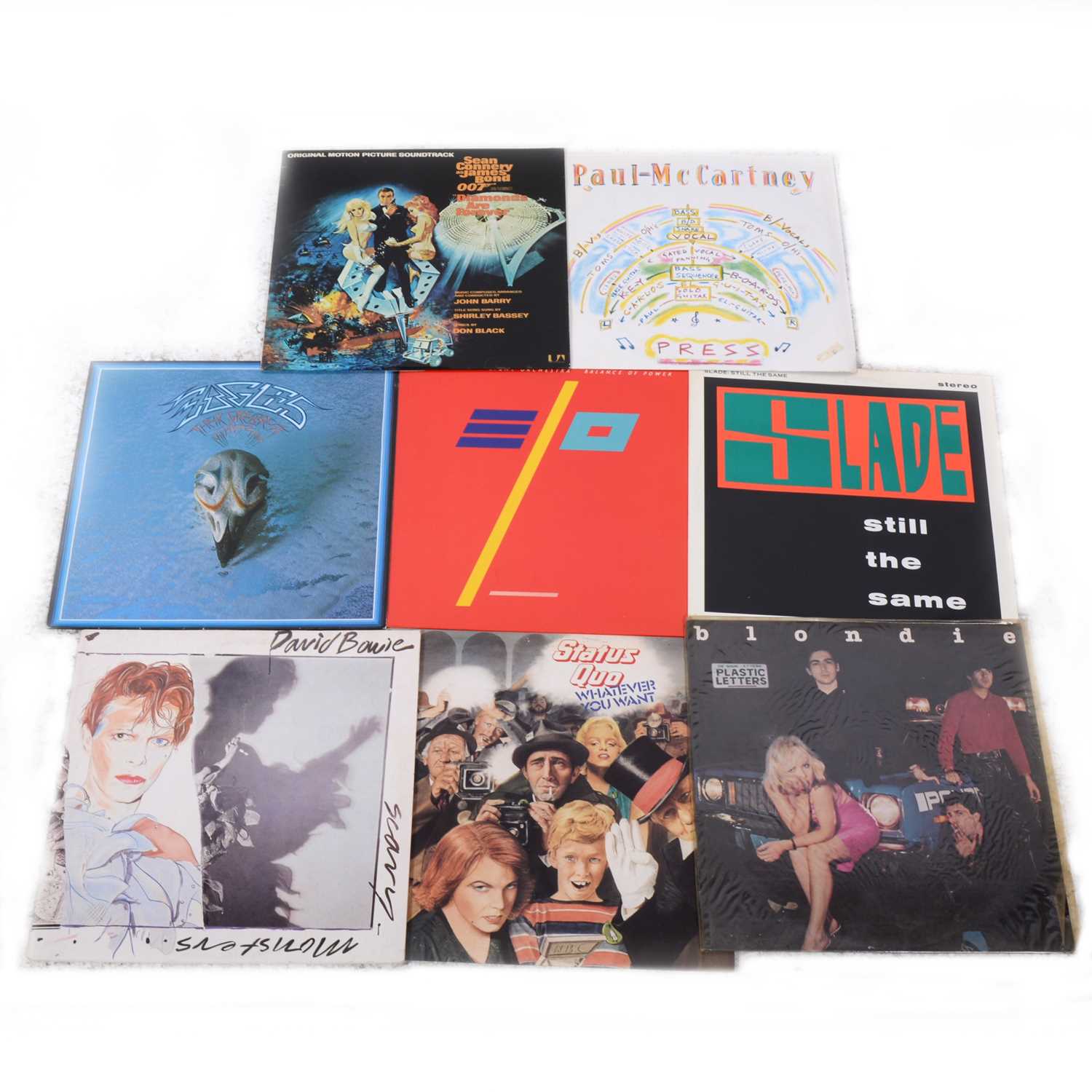 Lot 11 - Aprox 95 vinyl LP and 12" singles; mostly pop and rock music.