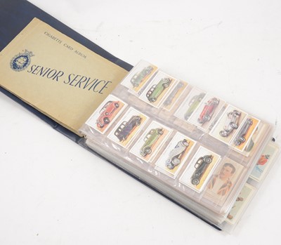 Lot 1135 - A ring binder album with cigarettes cards