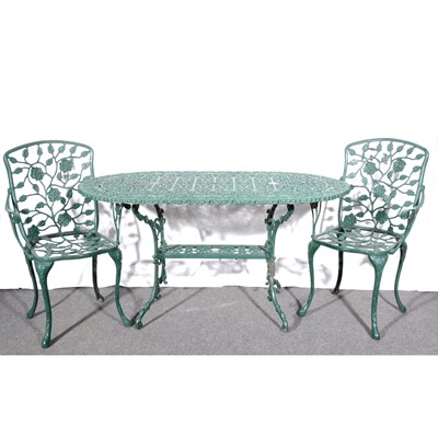 Lot 485 - A contemporary green painted metal patio table and six chairs