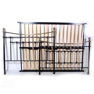 Lot 140 - A modern metal double bedstead and base