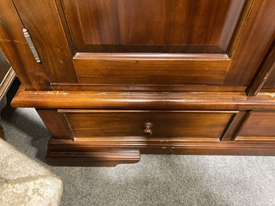 Lot 128 - A modern walnut double wardrobe