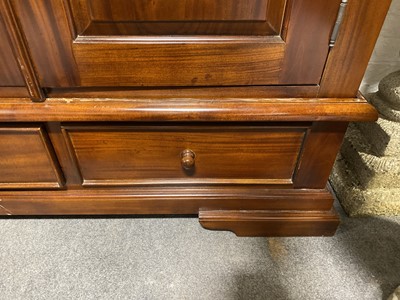 Lot 128 - A modern walnut double wardrobe