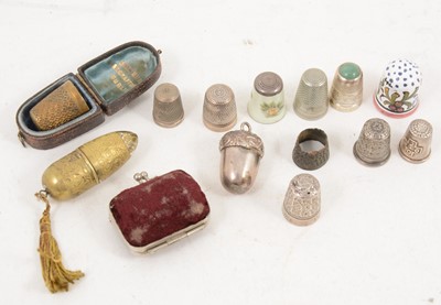 Lot 1157 - Sewing Interest - ten thimbles and three thimble cases.