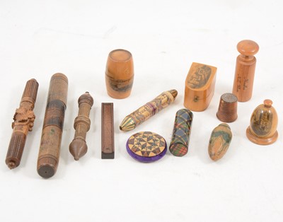 Lot 1163 - A collection of treen sewing requisites.