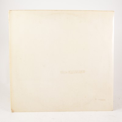 Lot 5 - The Beatles White Album LP vinyl record; Mono pressing no.0021390, PMC 7067/7068, embrossed cover, top opening, with four portraits and poster.