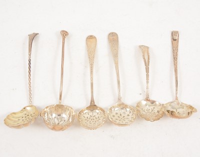 Lot 1209 - Six small silver sugar sifting spoons.