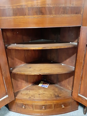 Lot 160 - A Victorian mahogany bowfront corner cupboard