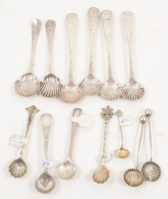 Lot 1195 - A set of four bright cut salt spoons byThomas Bradbury & Sons and nine others.