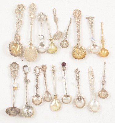 Lot 1194 - Eighteen decorative and novelty silver salt spoons.