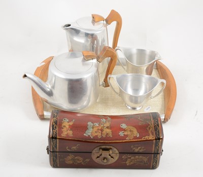 Lot 1088 - Picquot ware four-piece teaset on a matching tray