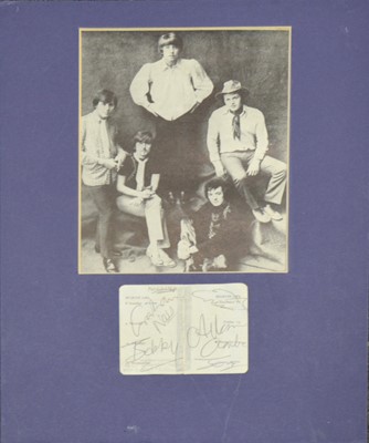 Lot 77 - The Hollies signatures; set of five, signed on diary page mounted on card with print out photos.