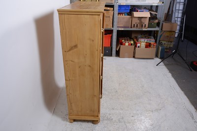 Lot 133 - A pine pantry cupboard