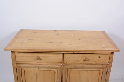 Lot 134 - A pine side cupboard
