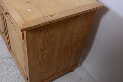 Lot 134 - A pine side cupboard