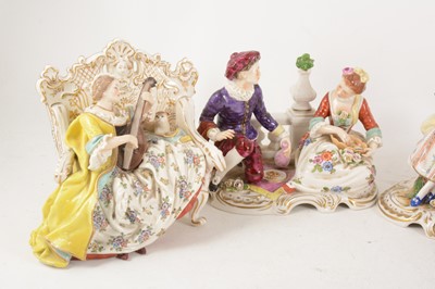 Lot 1032 - Four Continental porcelain figures, including pair of seted musicians