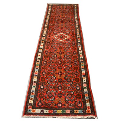 Lot 1612 - A Persian runner and three mats