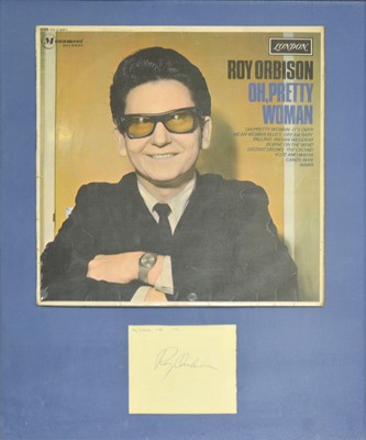 Lot 80 - Roy Orbison; signed page mounted with vinyl album cover of 'Oh, Pretty Woman', framed and glazed, 49.5x39cm.