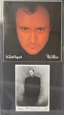 Lot 87 - Phil Collins; signed photo, framed and glazed.