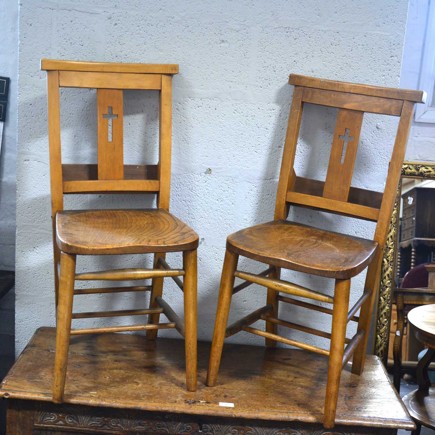 Lot 56 - A set of five beech and mixed wood Chapel chairs