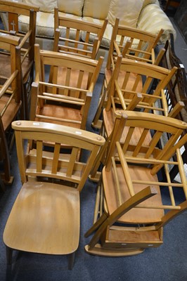 Lot 59 - A set of eleven beech and mixed wood Chapel chairs