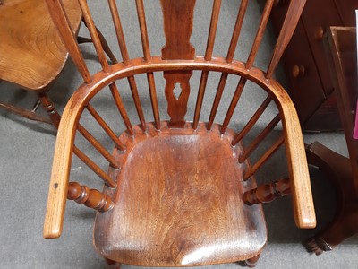 Lot 77 - An elm and ash Windsor chair