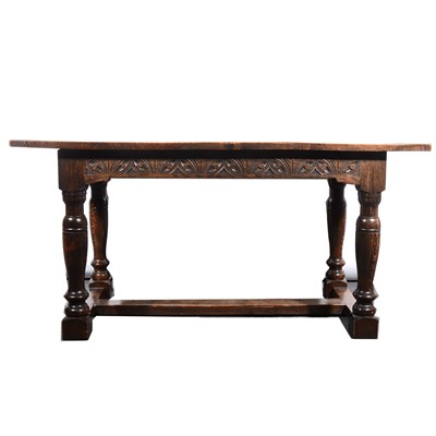 Lot 38 - An oak dining table, rectangular boarded top