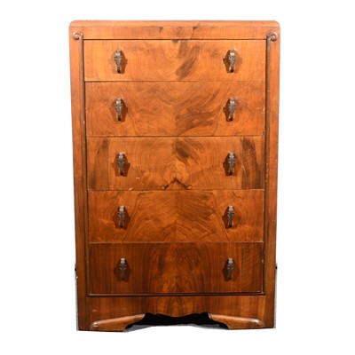 Lot 65 - A 1930s walnut tallboy chest