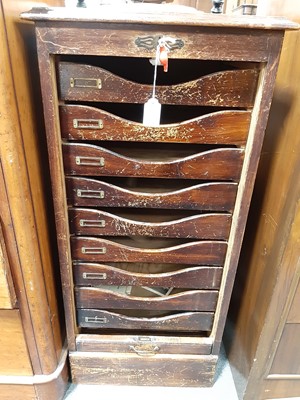 Lot 66 - An oak tambour front filing cabinet