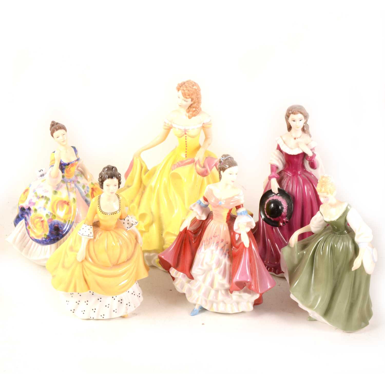 Lot 1020 - Eleven Royal Doulton figurines and another