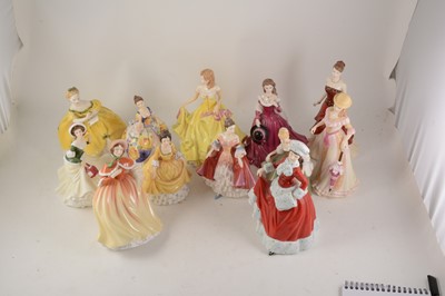 Lot 1020 - Eleven Royal Doulton figurines and another