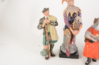 Lot 1009 - Three Royal Doulton figures: HN2356; The Judge, HN2443; The Jester (modern), HN3261 Laird
