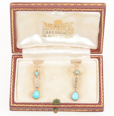 Lot 1234 - A pair of turquoise and diamond drop earrings.