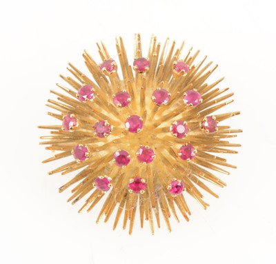 Lot 1291 - A French sea urchin brooch set with rubies.