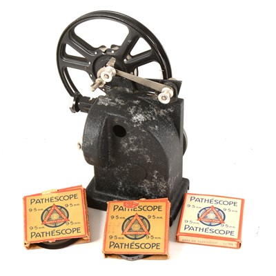 Lot 268 - A Pathescope ACE 9.5mm reel film projector, with booklets, motor, in original box.