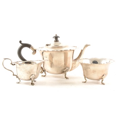 Lot 331 - An Edwardian silver three-piece bachelor's teaset by RF Mosley & Co., Sheffield 1907.