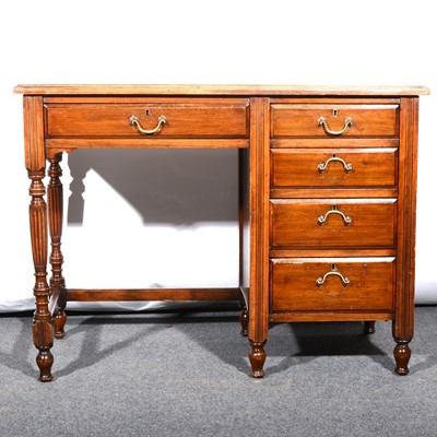 Lot 518 - An Edwardian stained walnut single pedestal desk