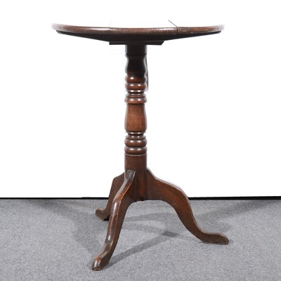 Lot 509 - An old oak tripod table