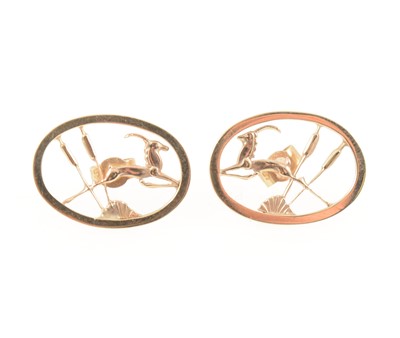 Lot 1238 - Geoffrey Bellamy for Ivan Tarratt a pair of 9 carat yellow gold leaping gazelle ear studs.